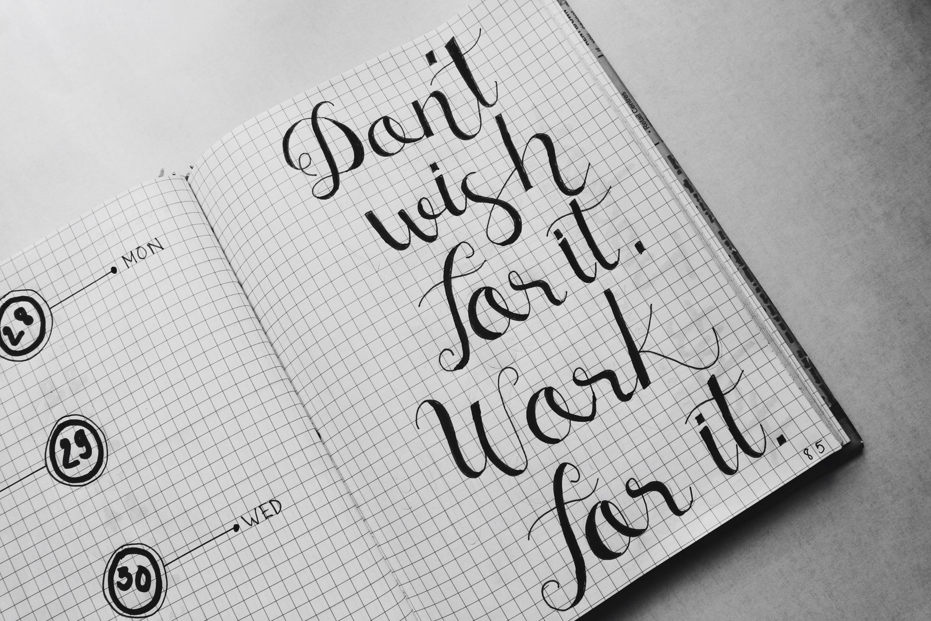 Small business website advice Sole trader working out how to price a job using a notepad and calculator