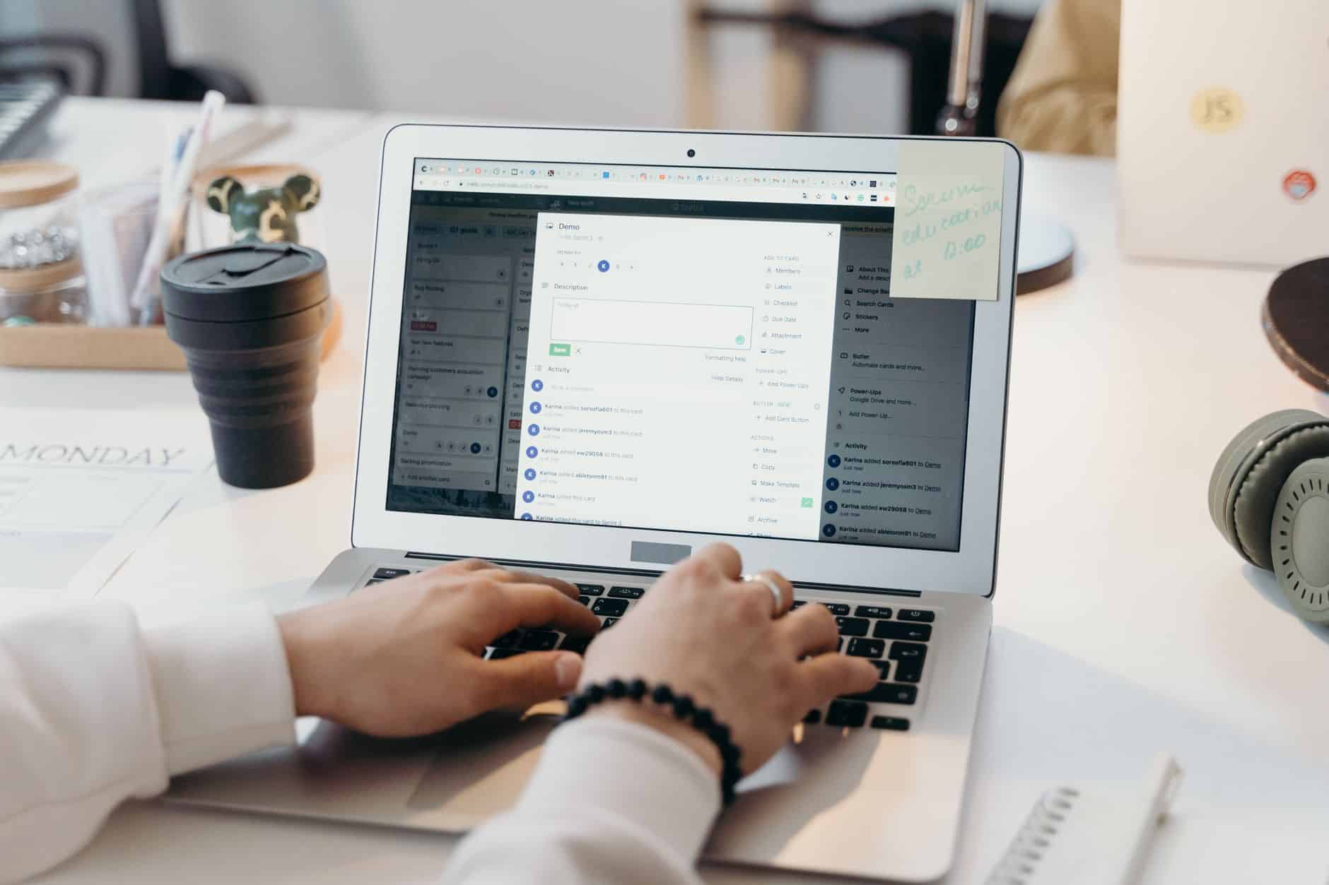 Small business website advice Small business owner checking a business email address on a laptop